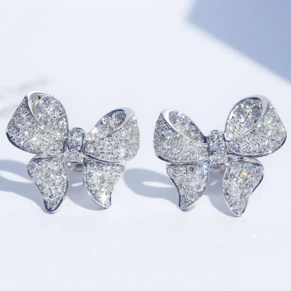 Jewelry - RESTOCKED! Stunning Silver Bow Earrings Bling Drip